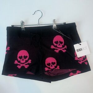 Beach Riot black loose shorts with hot pink skulls in size XS.